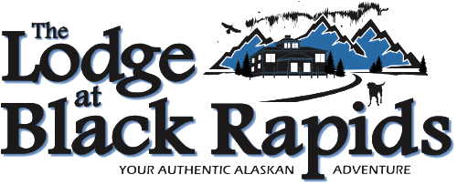 Logo for "The Lodge at Black Rapids," featuring a mountain backdrop and the tagline "Your Authentic Alaskan Adventure."